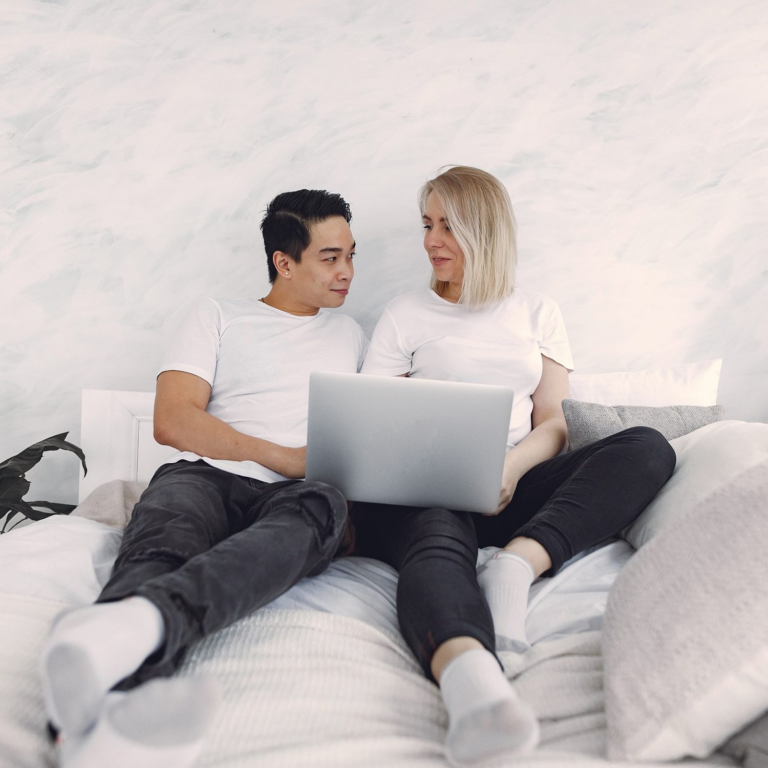 Canva - Man And Woman Sitting On A Bed.jpg 2500 px